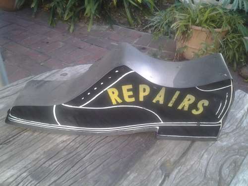 vintage shoe repair sign